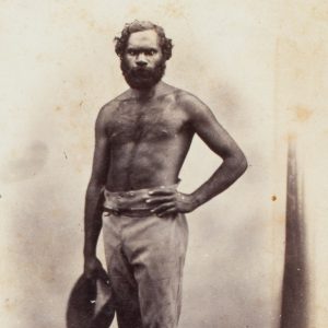 Studio portrait of an Aboriginal man holding his hat. Adelaide, 1864-65.