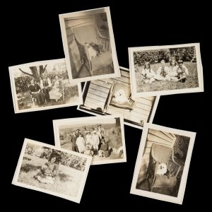 An Australian family and their pet dogs and cats: a furry snapshot group, 1915-1920.